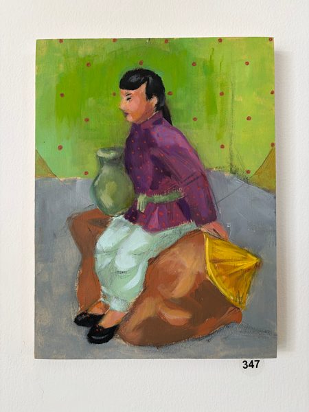 figurine looking left