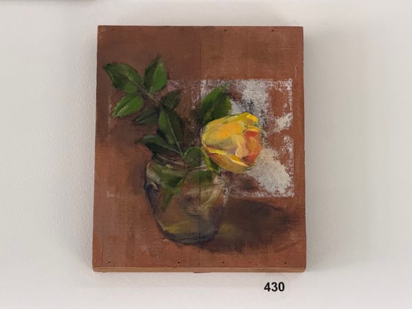 yellow rose on cigar box