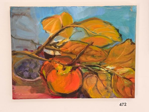 loose persimmon over blueberries